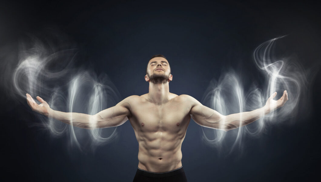 Powerful man meditating in peaceful area