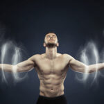 Powerful man meditating in peaceful area